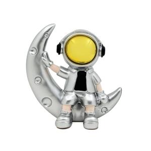 ASTRONAUTA SENTADO EN LUNA PLATA